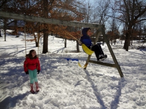 swinging in snow