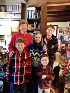 The kids with their piano teacher on Christmas Day
